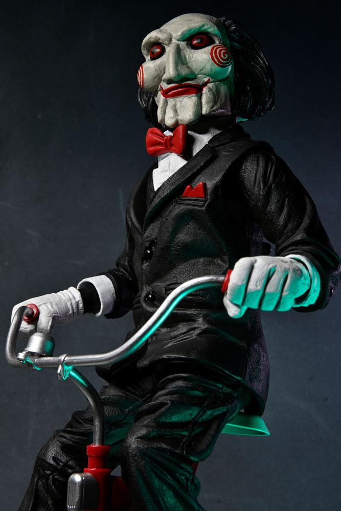 Zaagactiefiguur met geluid Billy met tricyle 30 cm