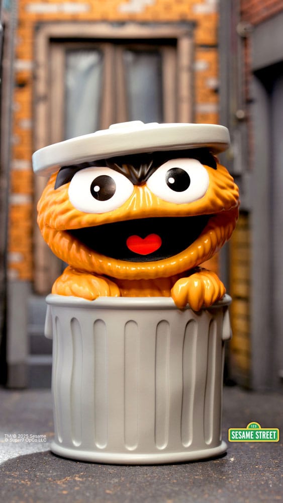 Sesamstraat LEUK! PLEZIER! Vinylactiefiguur Oscar de Grouch (oranje) 13 cm